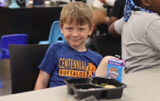 Child eating a meal at a Summer Feeding site.