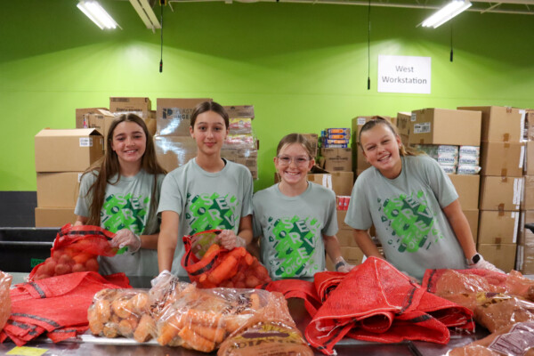 Students volunteer at the Regional Food Bank of Oklahoma.